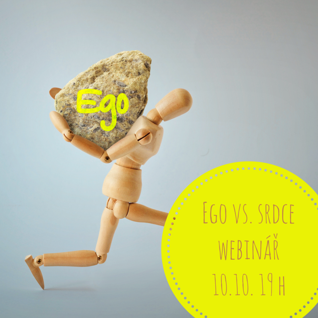 a wooden figure carrying a stone on his back